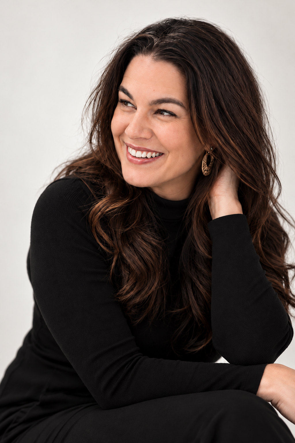 Chelle Temple smiling in a black top